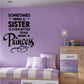 Inspirational wall decal with black quote: 'Being a sister is better than a princess'.