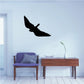 Black bird hovering wall decal