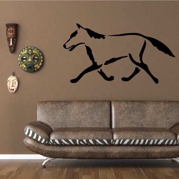 Black Southwestern-style coyote wall decal with running silhouette
