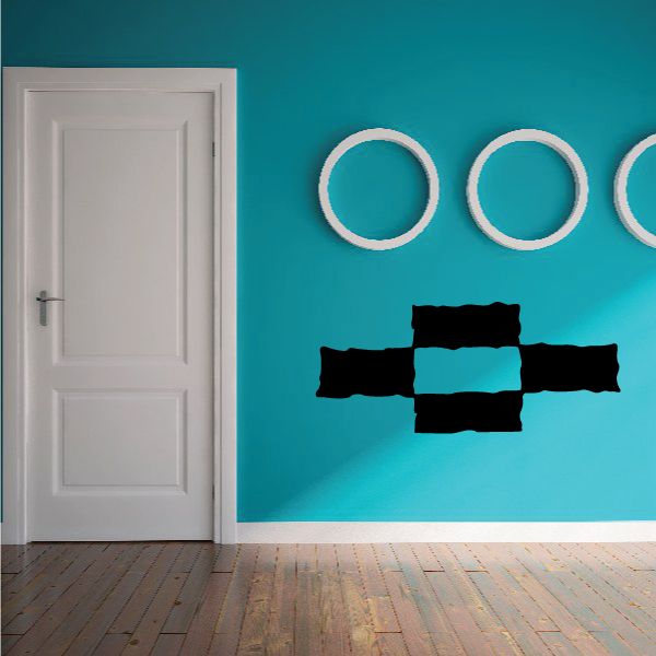 Southwestern cross wall decal with dark cross blocks and three white rings