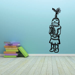 Native American doll decal, black-and-white outline figure with tall headdress and patterned clothing