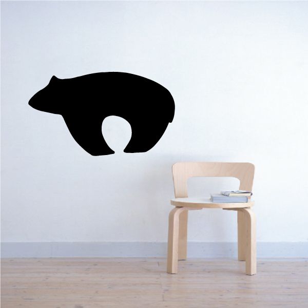 Bear silhouette wall decal, black with white cutout eye