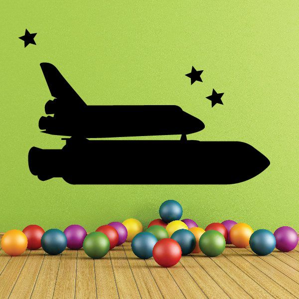 Space shuttle decal with black shuttle silhouette and small star accents