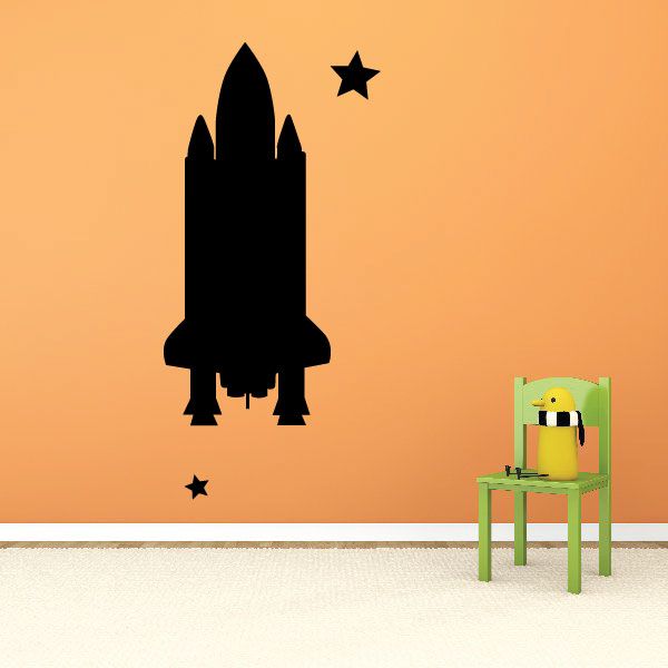 Space shuttle wall decal with rocket silhouette and small star