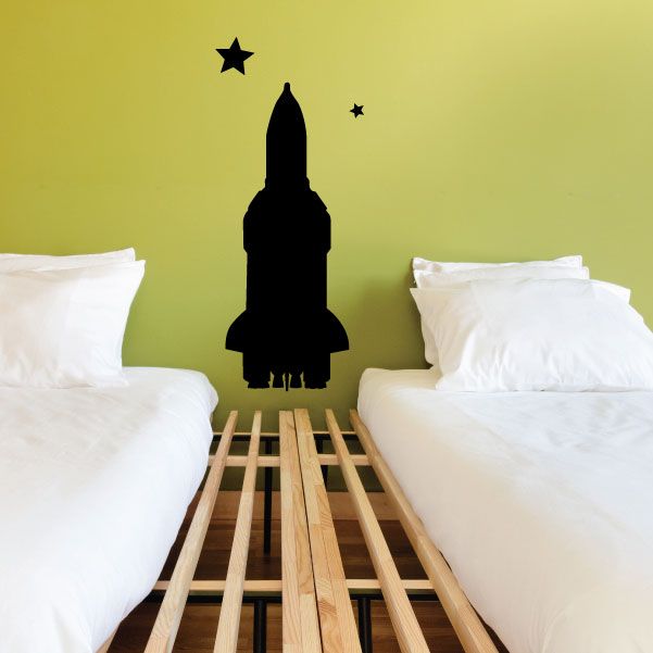 Space shuttle wall decal, black silhouette with small star shapes