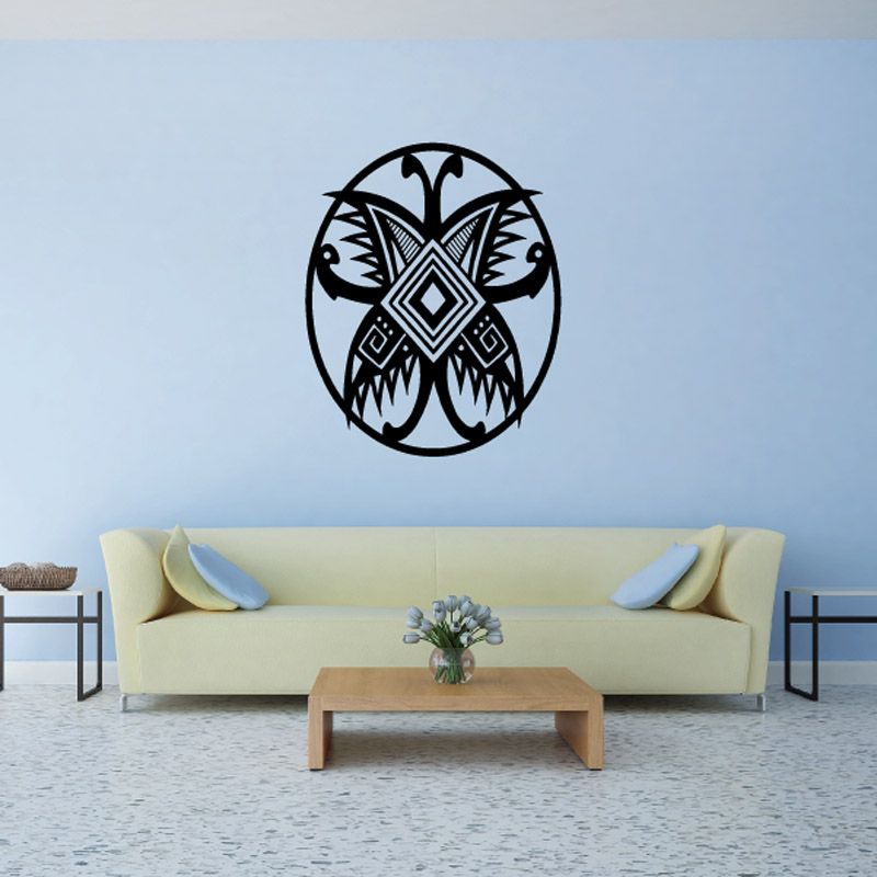 Spiked butterfly decal, black geometric design with circular outline and diamond center.