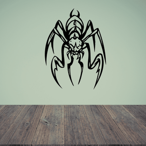 Black spiked beetle front-facing decal sticker with detailed mandibles