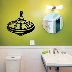 Black spin top vinyl wall decal with line-art design