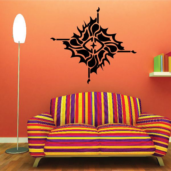 Tattoo-style black burst wall decal with flame-like center design