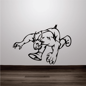 Sports mascot wall decal featuring a black-and-white crouching animal outline