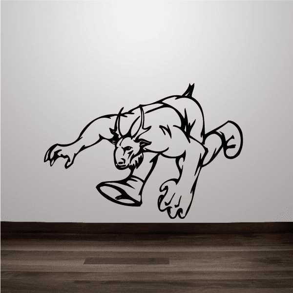 Sports mascot wall decal featuring a black-and-white crouching animal outline
