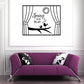 Black wall decal reading 'Spring is in the air' with curtains and music notes