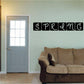 Spring wall decal with black 'spring' lettering