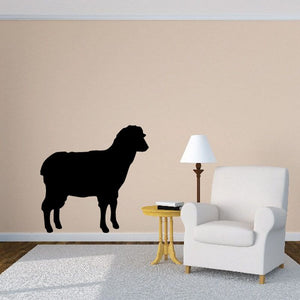 Standing lamb decal of a black silhouette, full body standing