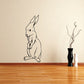 Standing rabbit decal with simple line drawing, long ears and paws