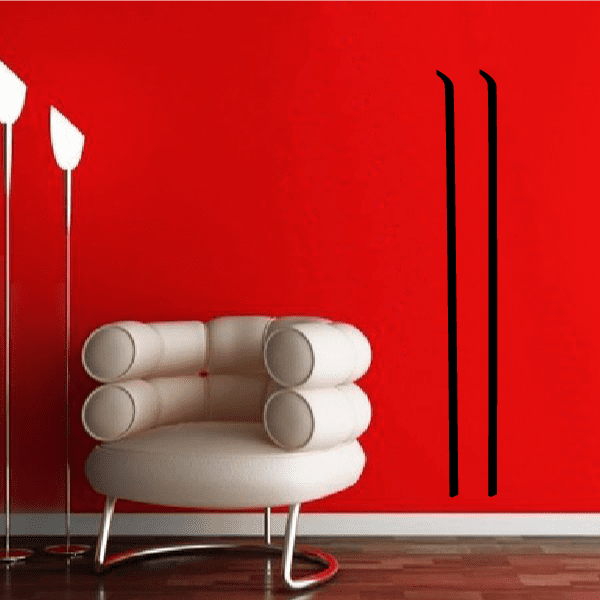 Ski wall decal: two tall black standing skis on red surface