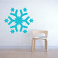 Turquoise star cross snowflake wall decal with small star accents