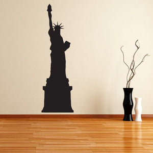 Statue of Liberty on pedestal wall decal, dark silhouette with torch raised