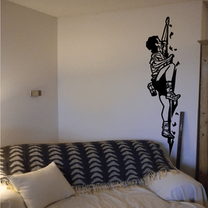 Rock climbing decal: black silhouette climber holding rope and harness