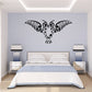 Tribal owl wing decal with ornate black tribal pattern on wall