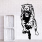 Tiger decal with roaring face and open mouth, black-and-white graphic.