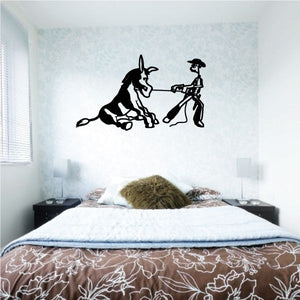 Black donkey wall decal with rider holding reins and saddle details