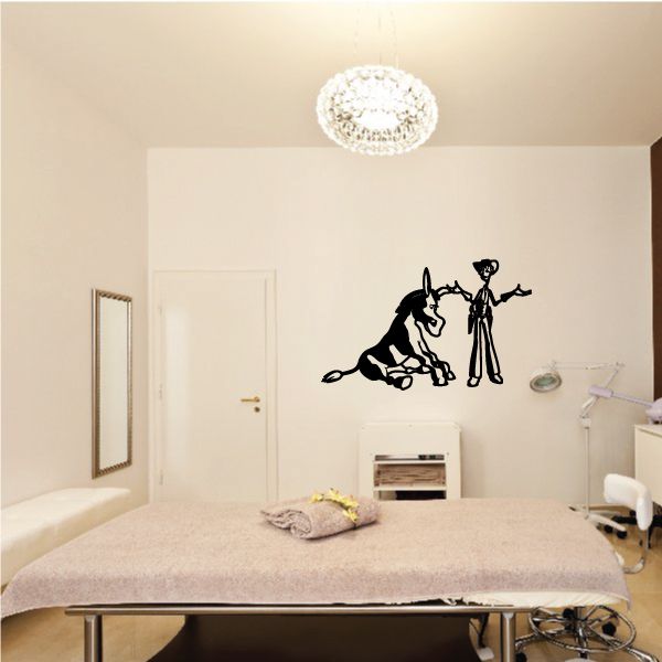 Black vinyl wall decal featuring donkey and rider silhouettes