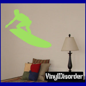 Surfing wall decal: green surfer silhouette on surfboard