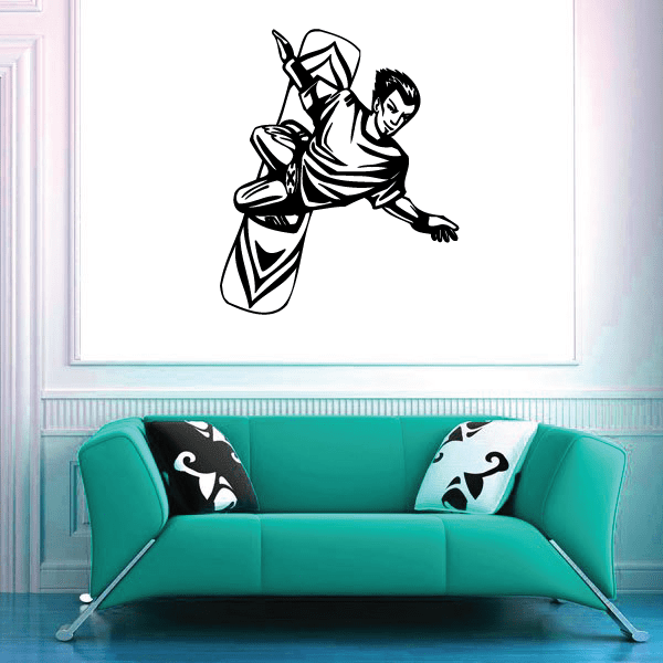 Surfing wall decal of black surfer silhouette on a white surface