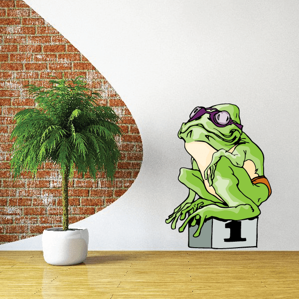 Swimming vinyl sticker of green cartoon frog with purple goggles, sitting on a pedestal