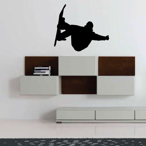 Snowboarding grab decal with black snowboarder silhouette in a dynamic pose