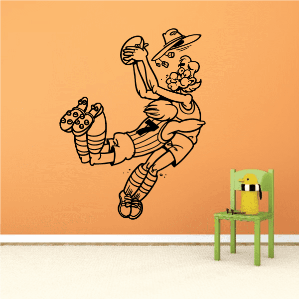 Rugby player cartoon wall decal with ball, helmet, and crossed stripes