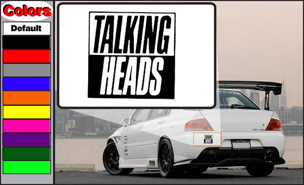 Talking Heads decal with black 'TALKING HEADS' lettering on white square.
