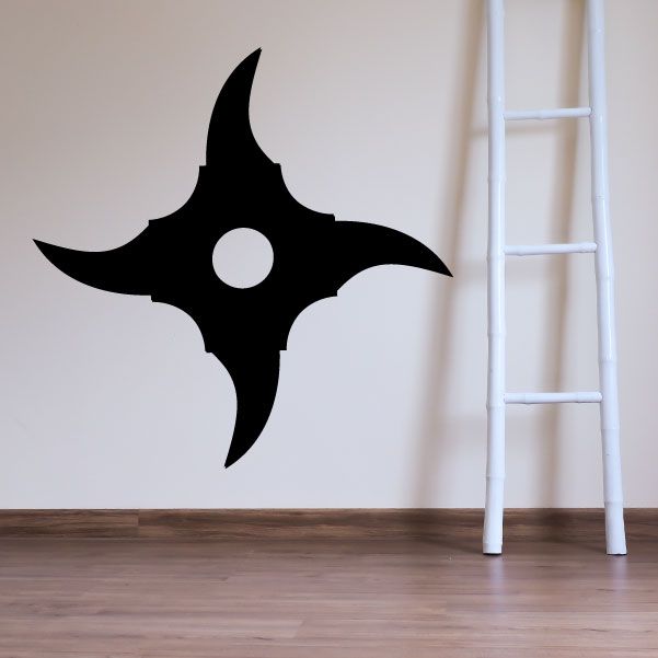 Black four-pointed ninja star with circular center hole