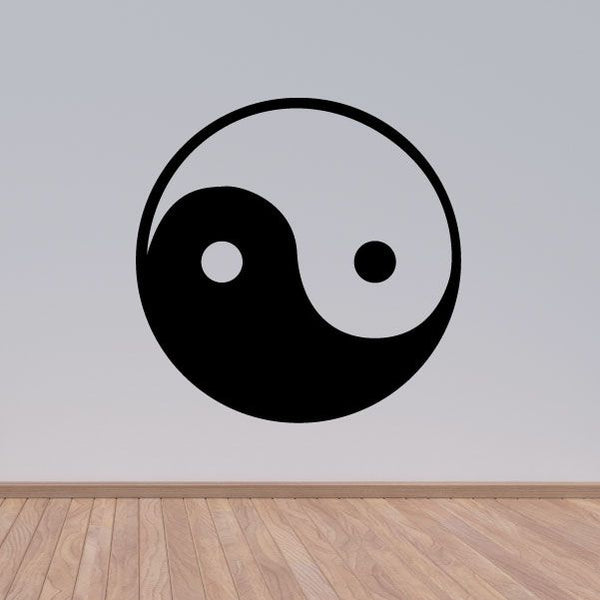 Yin and yang decal with black and white swirl inside a circular outline