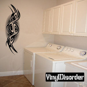 Black tribal tattoo-style wall decal with bird-like design