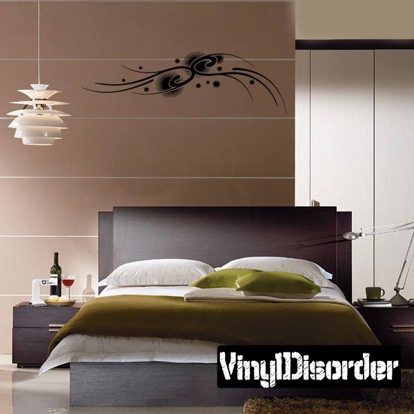Black tattoo swirl wall decal with decorative dots and curved lines