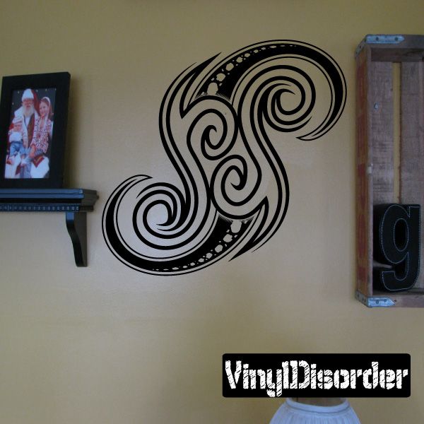 Black swirl vinyl wall decal with ornate curling pattern