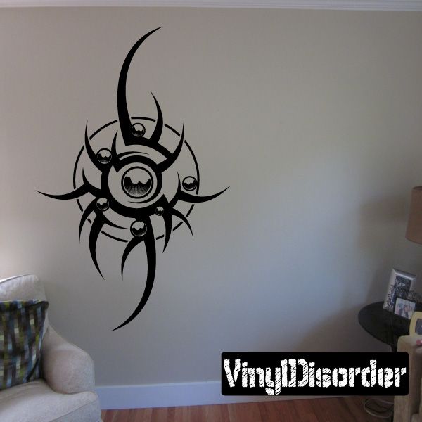 Tattoo wall decal featuring a black tribal skull with horns and eye details