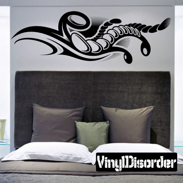 Tattoo wall decal vinyl with black curled lines and creature eyes above bed