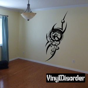 Black and white heart tattoo wall decal with winged circular design