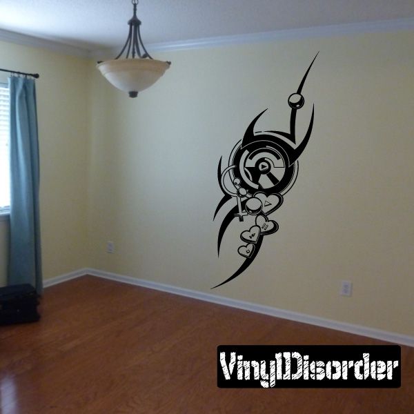 Black and white heart tattoo wall decal with winged circular design