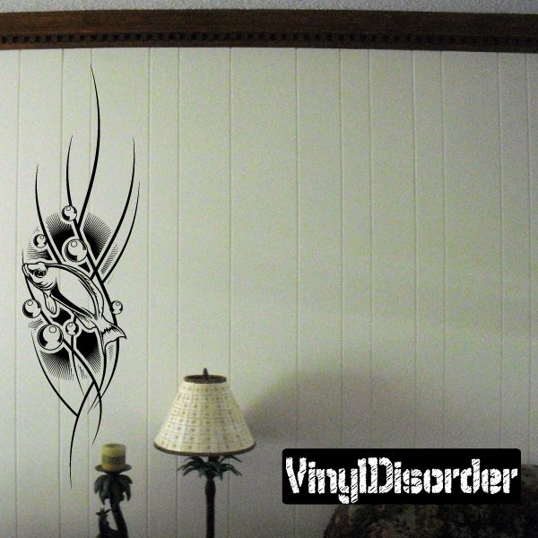 Black tattoo-style vinyl wall decal with ornate dagger and tribal linework