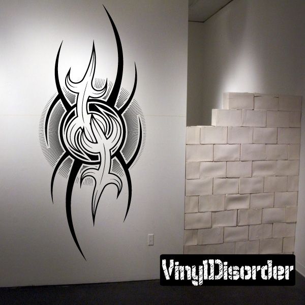 Tribal tattoo wall decal with black-and-white horned design, vinyl sticker