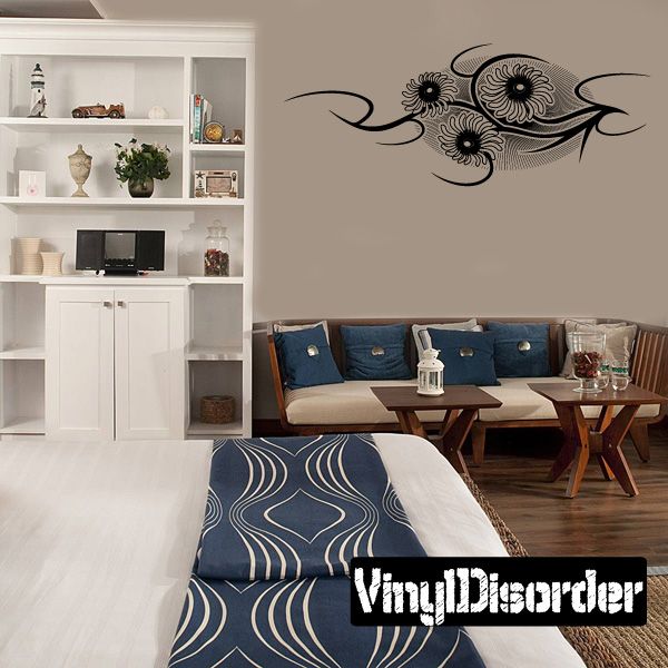 Vinyl wall decal with black floral and swirling vine pattern