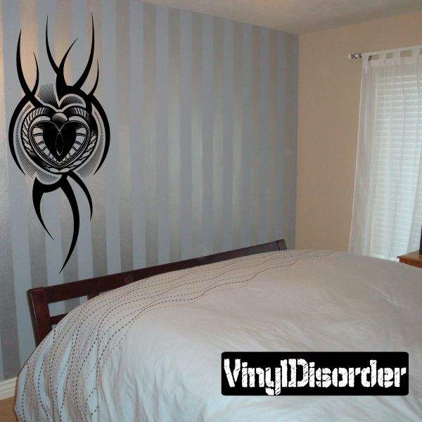 Black heart-and-wings tattoo wall vinyl decal with ornamental tribal design