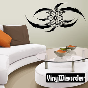 Ornate black-and-white tattoo wall decal with central floral starburst and swirls