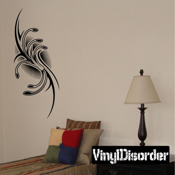Black tribal tattoo wall decal with sweeping feather-like swirl design