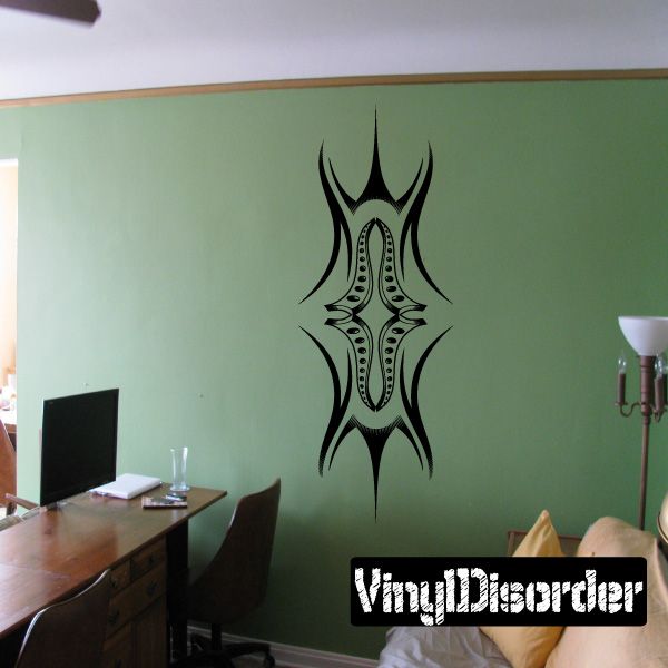 Vinyl wall decal of black tribal tattoo crossburst design