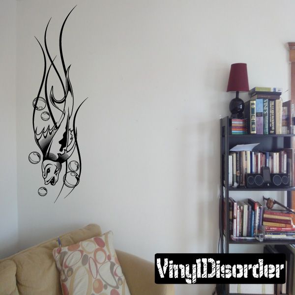 Black tribal tattoo wall decal with skull and swirling vines